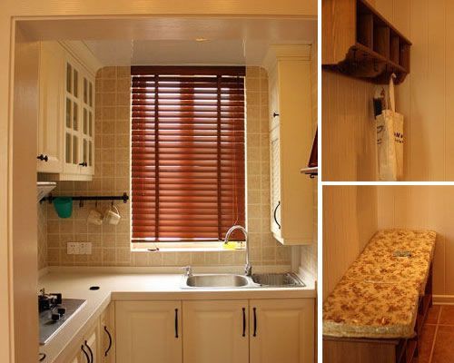 整个厨房空间采用白色基调和原木家具，显得简洁有型。木质的餐台带来了自然的味道