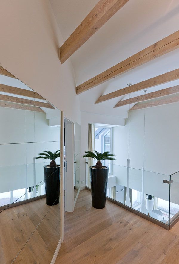 波兰现代室内设计 枫木地板装大气空间(组图) 