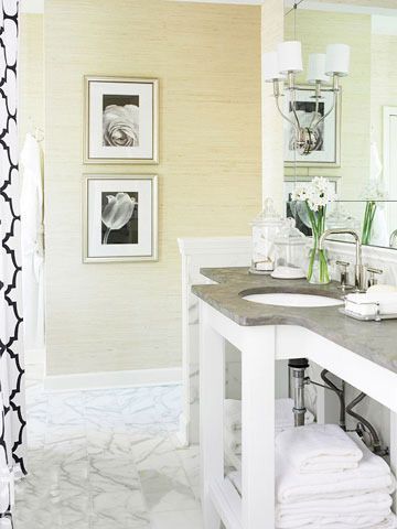 用草质感的壁纸装饰卫浴间墙面，实用且环保。搭配清新的淡绿色，让墙面呈现出环保自然的感觉