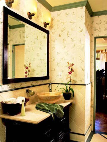 深色的浴室柜和镜面从颜色和质感上体现时尚的气质，镀金的洗面盆从细节上将整个新中式风格体现得非常完美