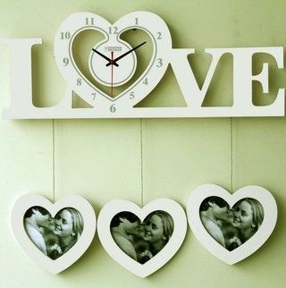 心型壁钟，还可以把你心爱的照片悬挂上去哦。很有爱