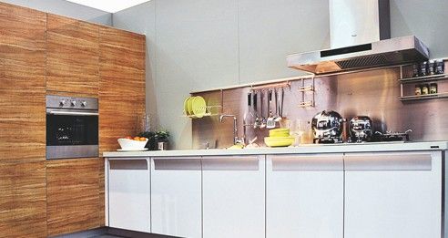巧用装饰设计 简约橱柜带来现代厨房生活(图) 