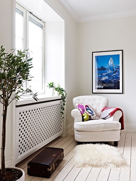 62平整洁北欧公寓 浅色地板搭纯白居室[图] 